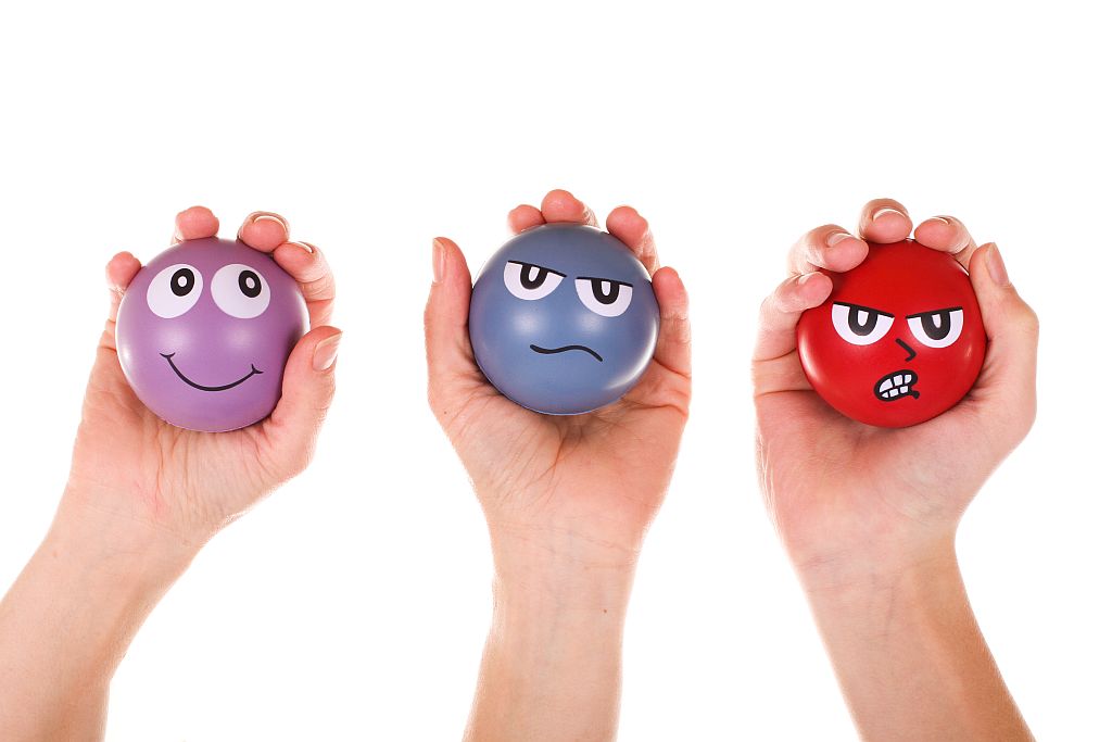 3 Hände mit Stressbällen, Foto: Adobe Stock