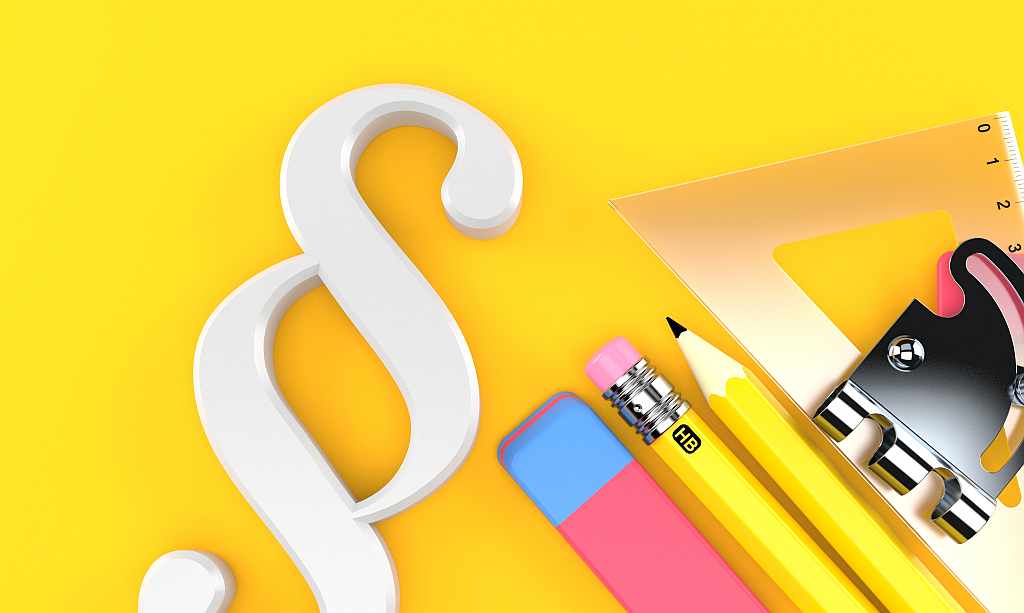 Paragraph und Schulutensilien, Foto: Adobe Stock